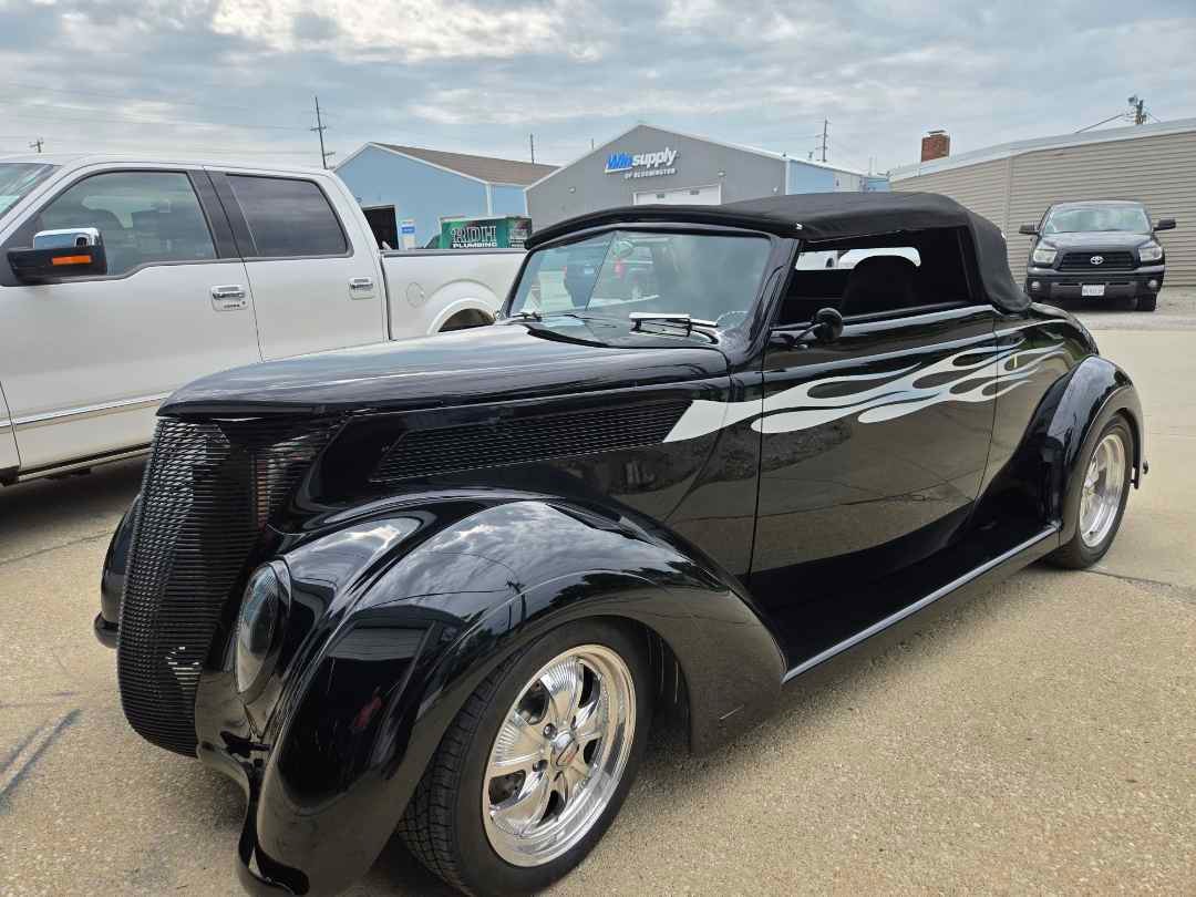 1937 Ford black hot rod convertible with flames