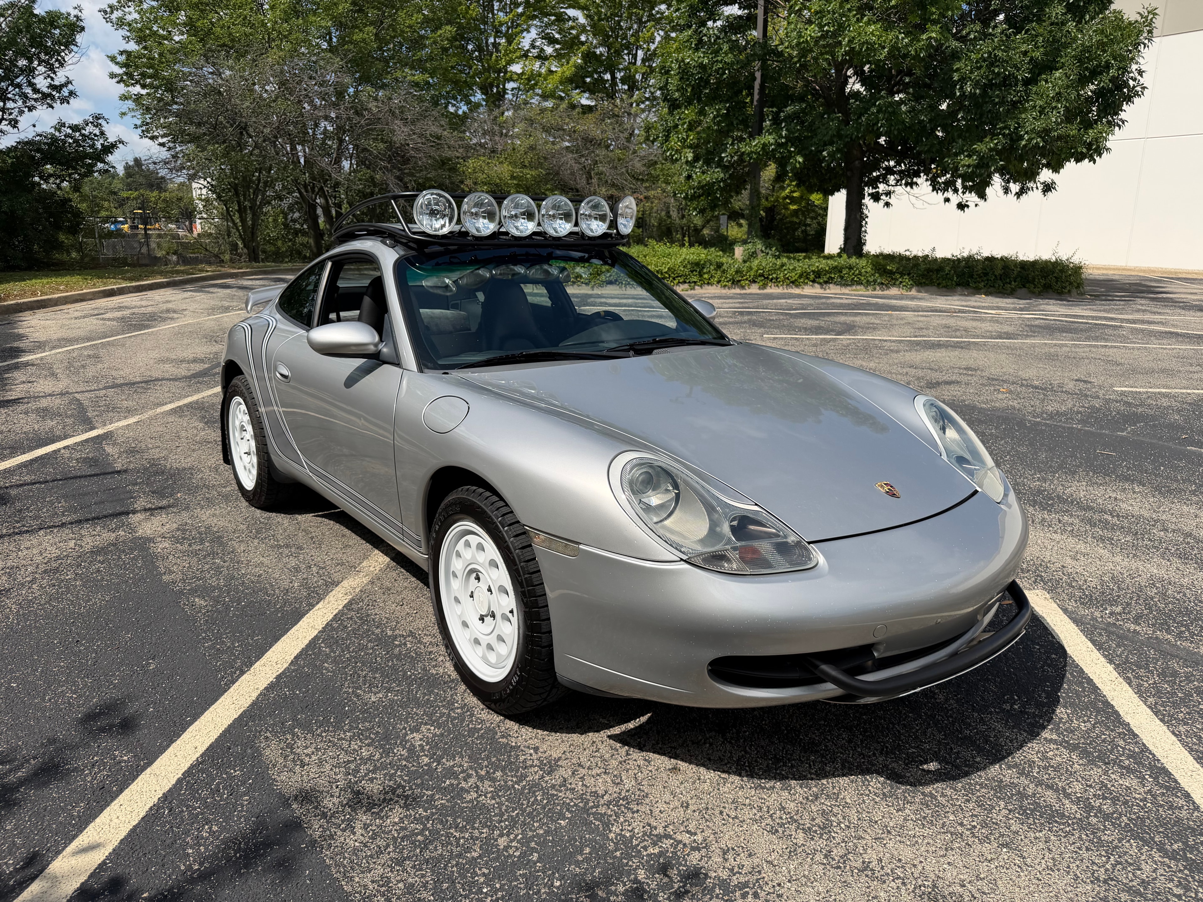 Silver Porsche 911 with roof rack